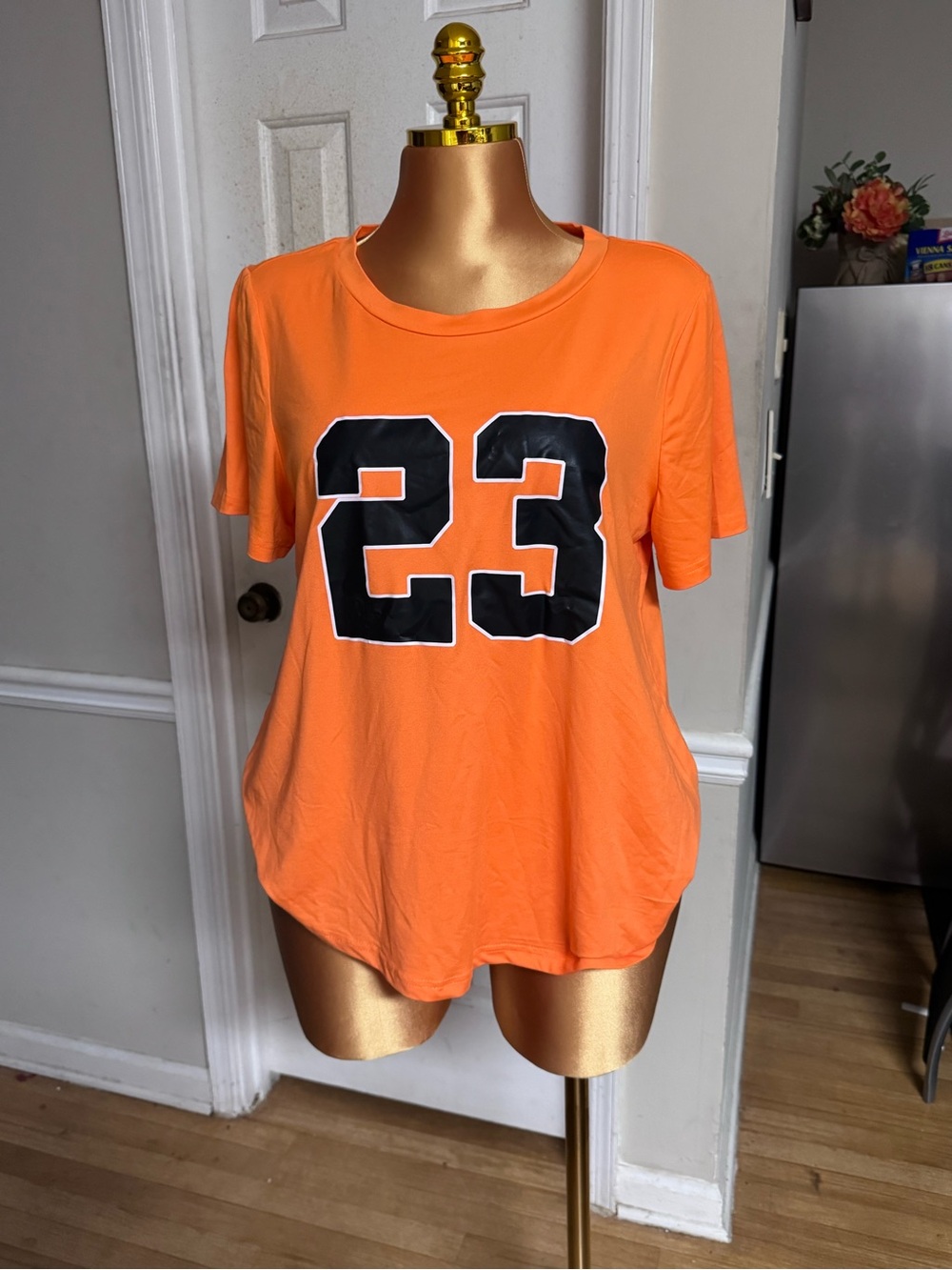 Women's Orange Short-Sleeve Graphic Tee with Black '23'